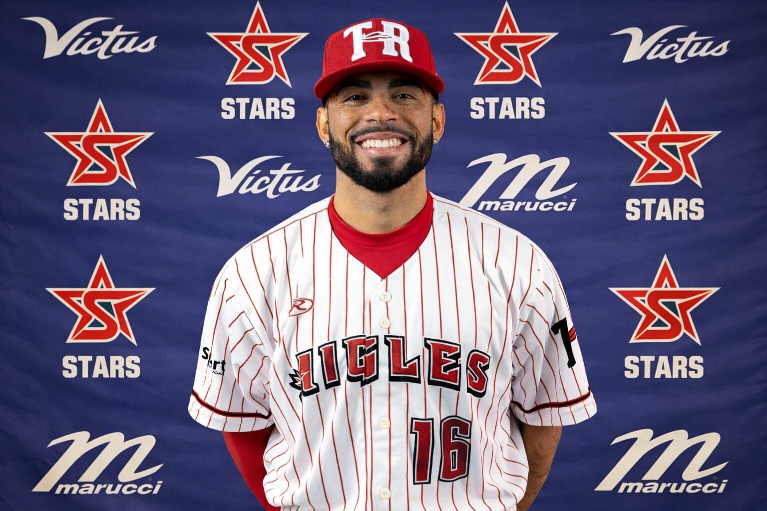 Smiling baseball player in uniform
