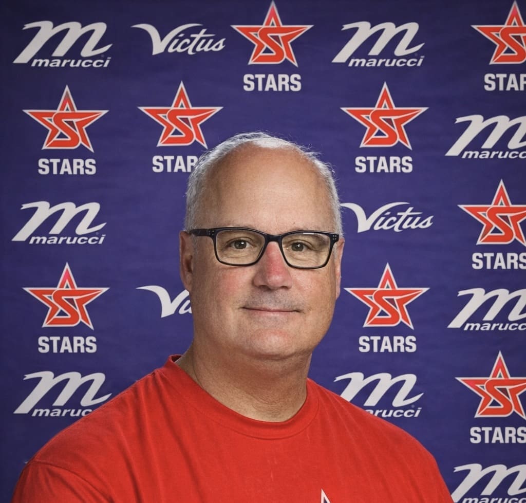 Professional headshot with Stars logo backdrop